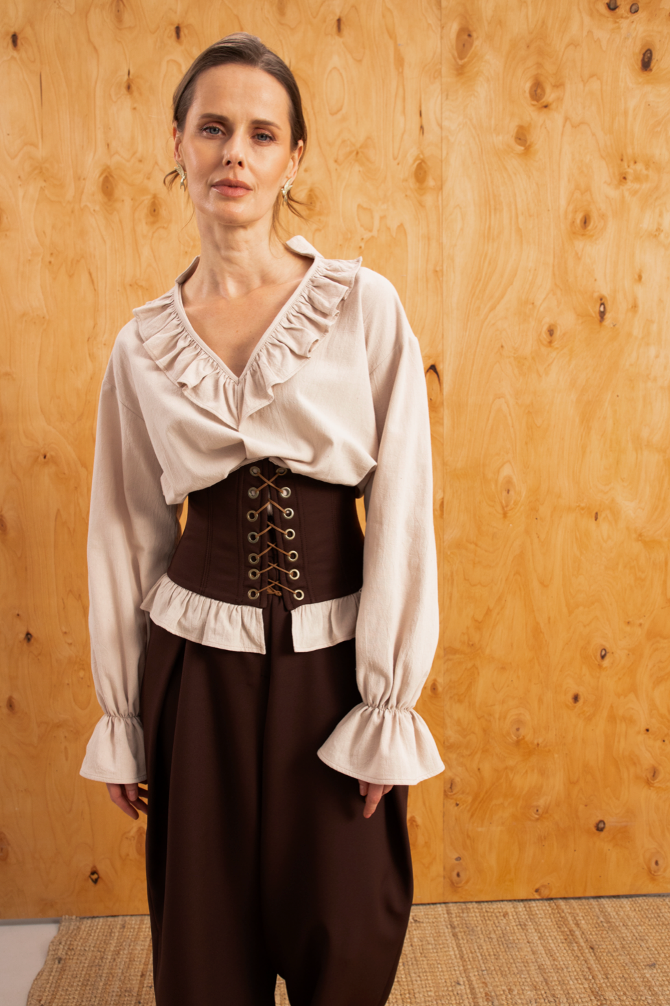 Корсет з рюшами коричневий