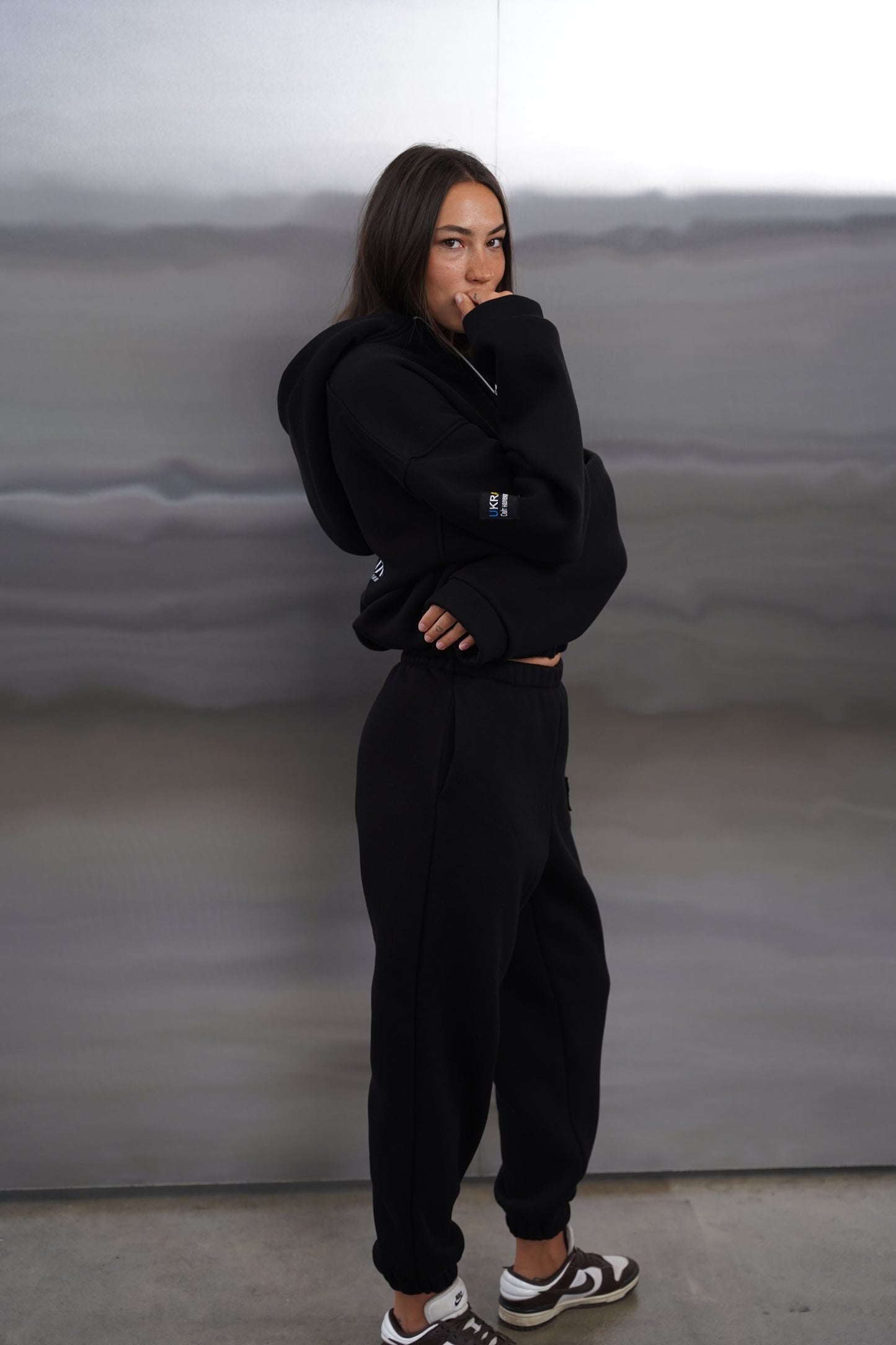 Жіночий спортивний костюм чорний UA