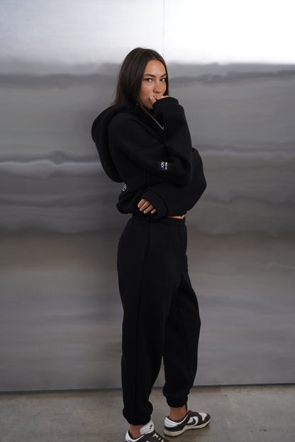 Жіночий спортивний костюм чорний UA