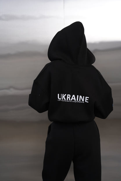 Жіночий спортивний костюм чорний UA